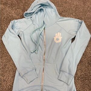 Light blue zip up hoodie. Women’s size small.